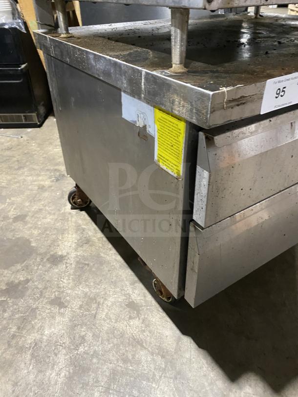 Arctic Air commercial stainless steel 2-drawer refrigerated chef base, model ARCB36Z, on casters, visible wear.