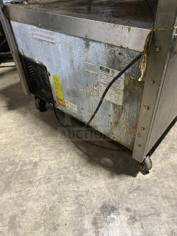 Arctic Air ARCB36Z refrigerated chef base, stainless steel, 2-drawer, model SN: H20007715, on casters, used condition.