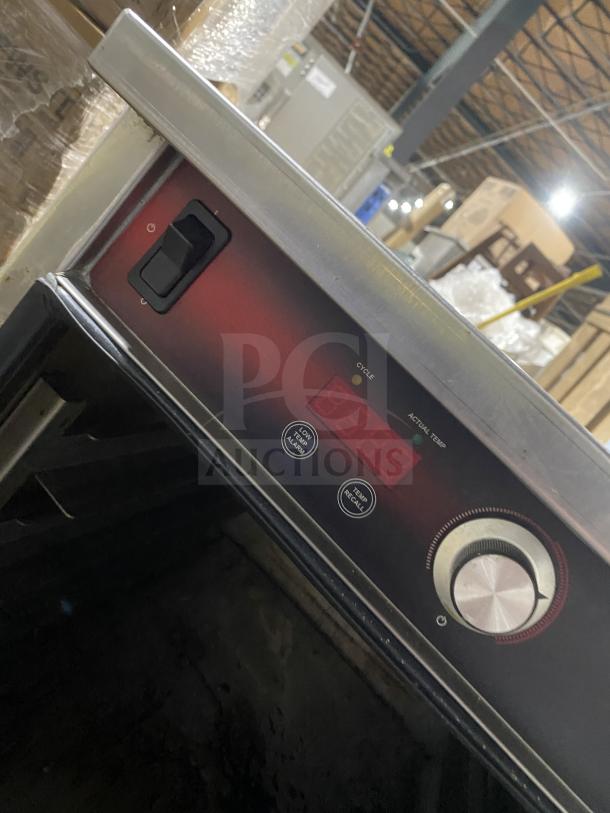 FWE Handy Line Series stainless steel electric heated holding cabinet, model HLC-1826-4-UC, with control panel and dial.