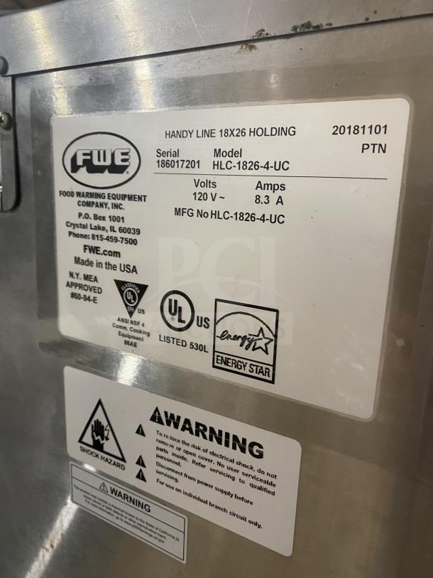 FWE Handy Line Series stainless steel 4-pan heated holding cabinet, model HLC-1826-4-UC, serial 186017201, on casters, 120V.