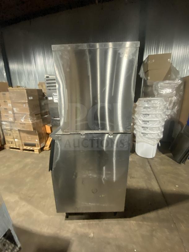 Hoshizaki KM-660MAJ commercial stainless steel ice machine on legs, air-cooled, crescent cube style, model SN: N09932G, 115V.