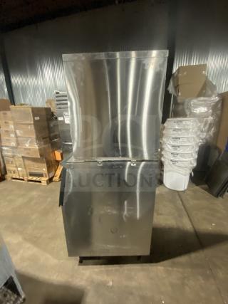 Hoshizaki KM-660MAJ commercial stainless steel ice machine on legs, air-cooled, crescent cube style, model SN: N09932G, 115V.