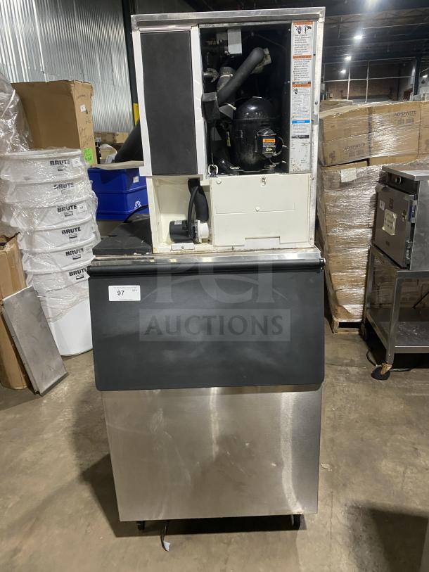 Hoshizaki KM-660MAJ ice machine, stainless steel, air-cooled, 115V, 1 phase, crescent cube style, on legs, model tag visible.