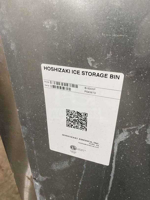 Hoshizaki Slim Line ice maker, Model KM-660MAJ, 115V 1 Phase, stainless steel, air-cooled, on legs, with visible ID label.