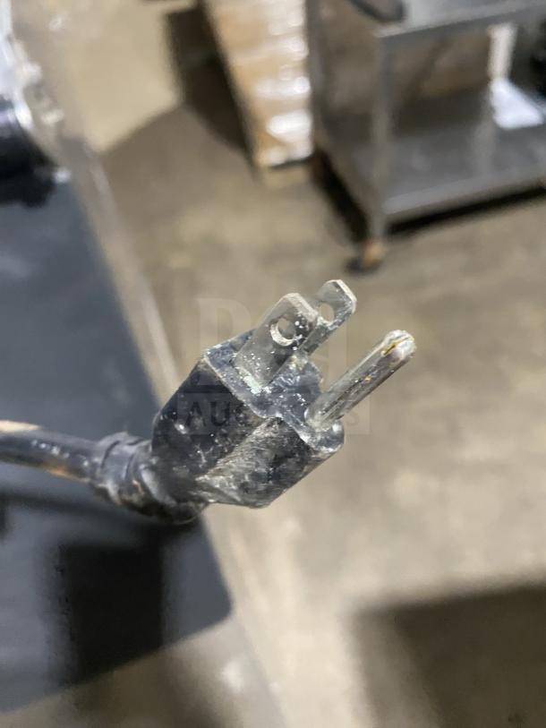 Close-up of a power plug for a Hoshizaki Slim Line Series ice machine, model KM-660MAJ, 115V, 1 phase.