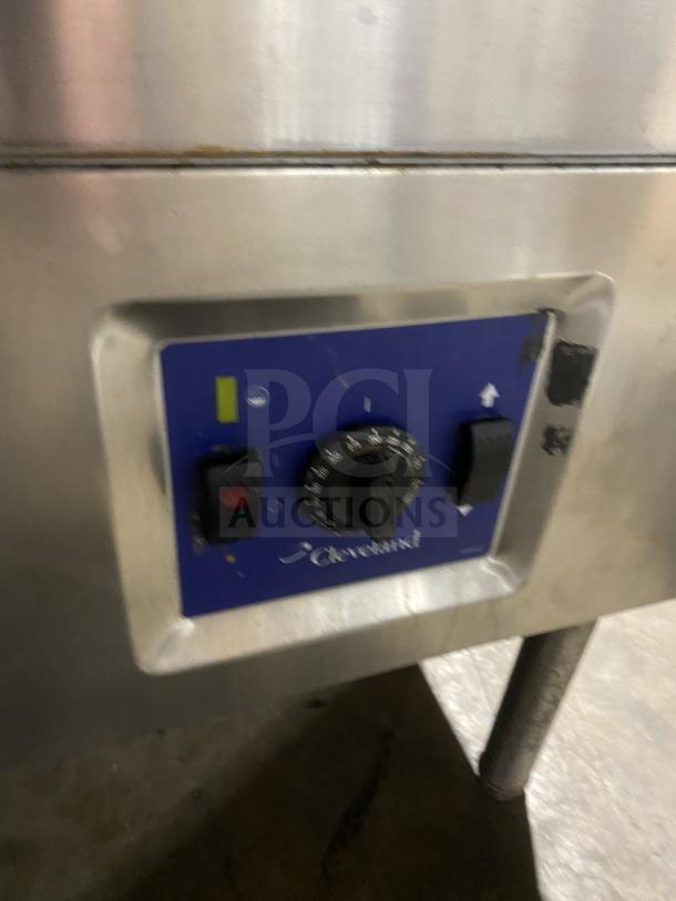 Cleveland commercial stainless steel gas-powered tilt skillet, ultra model. Features control panel with dials, sturdy legs.