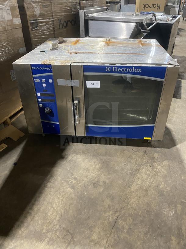 Electrolux Air-O-Convect commercial stainless steel combi oven, natural gas, with Touchline controls and wired oven rack.