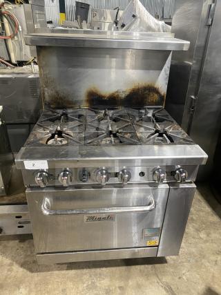 Migali commercial 6-burner gas stove, model CRO6B, with oven, raised backsplash, salamander shelf, on casters, stainless steel.