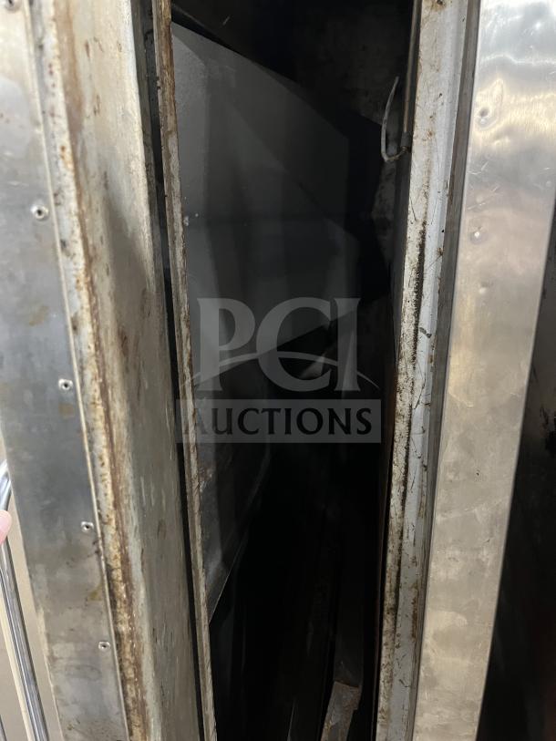 Bakers Pride Y600/602 stainless steel double-stacked gas pizza oven, showing interior compartment, used condition.