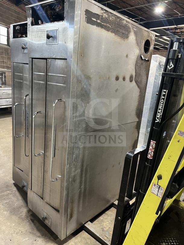 Bakers Pride Y600/602 double-stacked gas pizza oven, stainless steel, used condition, for commercial use.
