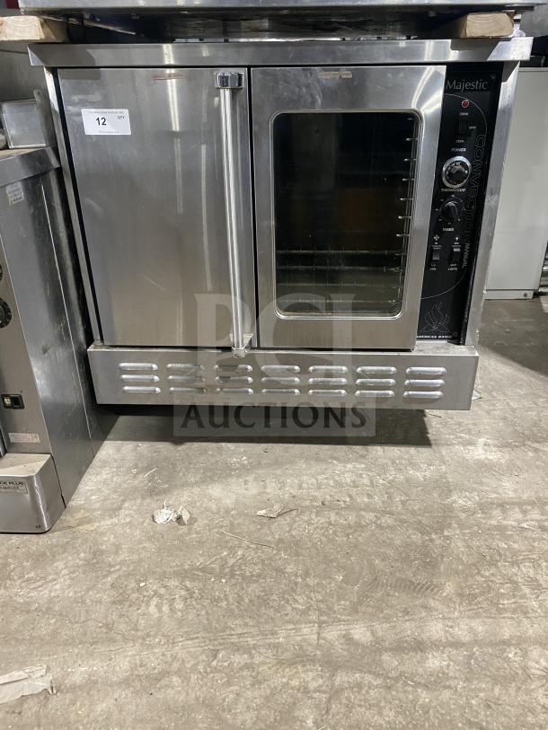 Majestic Series stainless steel single stack convection oven, wired racks, good condition, visible control panel and door label.