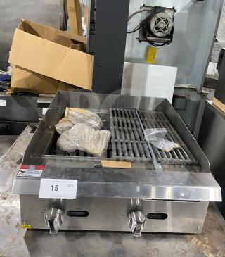 Cayvo CVCB-24LP commercial stainless steel gas char-rock broiler. Excellent condition with two control knobs and grill top.