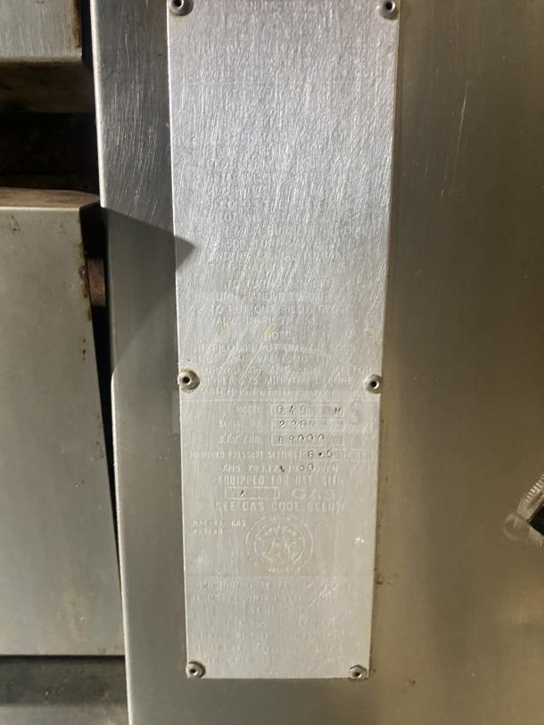 BARI Model 648 stainless steel gas pizza oven. Double stacked, serial 2267. Features include metal identification plate.