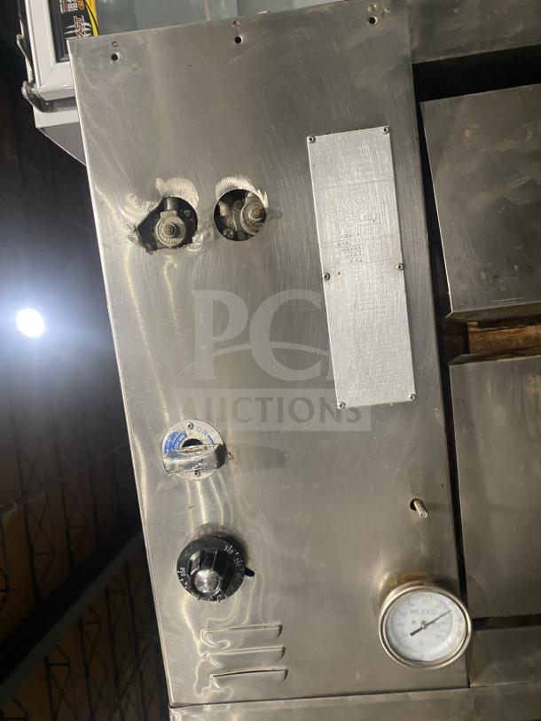 BARI stainless steel gas pizza oven, Model 648. Double stacked, control knobs visible. Serial 2267. Used condition.