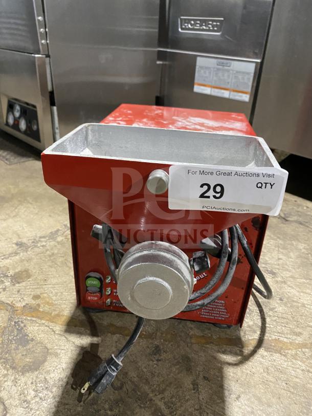 Olde Tyme PN2 peanut butter grinder, model SN A16070912, red, 115V, 1 phase, used condition, with power cord and auction label.