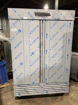 Kutano KUTF 2 SS stainless steel reach-in freezer with 2 doors, new condition. Model: KUTF 2 SS, SN: 8103206950, 115V, 1 Phase.