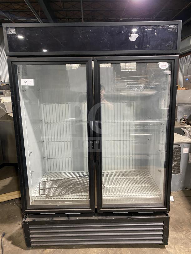 True commercial freezer, model GDM-49F-HC-TSL01, stainless steel with black body, two glass doors, 1 phase, SN: 9159869.
