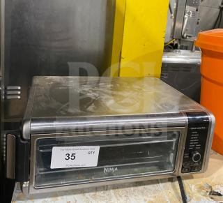 Ninja Countertop Digital Air Fry Oven, Model FT102CO, with view-through door and control panel. Used condition. 120V.