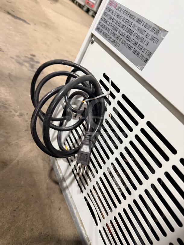 Avantco Glass Door Cooler Model 178GDC10HCW, shows coil and caution label, 115V, 1 phase, serial 6467310117070210.