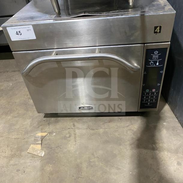 Amana commercial stainless steel microwave oven, model AXP. Features digital controls. Good condition, 208-230V label.