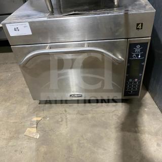 Amana commercial stainless steel microwave oven, model AXP. Features digital controls. Good condition, 208-230V label.