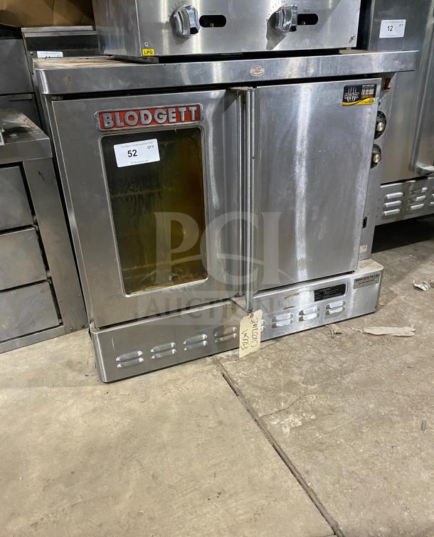 Blodgett stainless steel electric single stack convection oven with thermostatic control and wired rack, visible brand logo.
