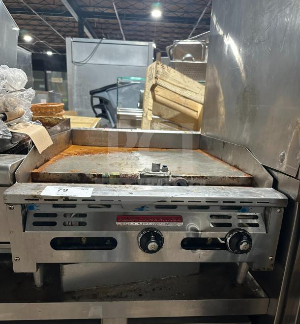 American Range stainless steel natural gas countertop griddle, model AETG-124-24XT, with back and side splash on casters.