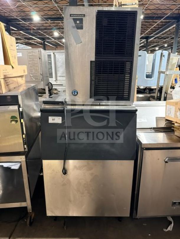 Hoshizaki KM-660MAJ ice machine, stainless steel, air-cooled, crescent cube style, 115V, on legs, model/serial visible.