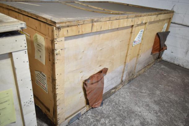 BRAND NEW Scratch and Dent LBC LRO-2G6-N-70 commercial gas rack oven in wooden crate, labels visible.