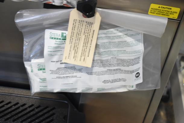 2025 Stoelting F131-38I2-SAMS soft serve machine, 2 flavor with twist, 1 phase, new condition, visible instruction and caution tags.