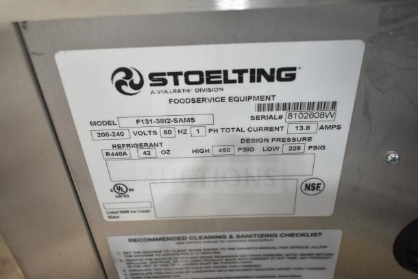 Stoelting F131-38I2-SAMS commercial ice cream machine label showing model, volts, refrigerant type, and NSF certification.