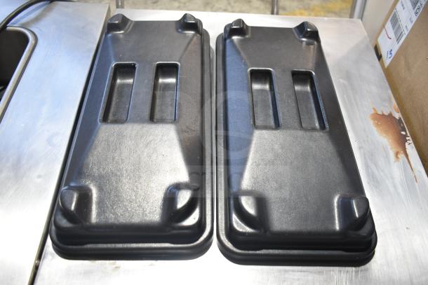 Stoelting F131-38I2-SAMS ice cream machine top view, black lids, stainless steel surface, commercial use.