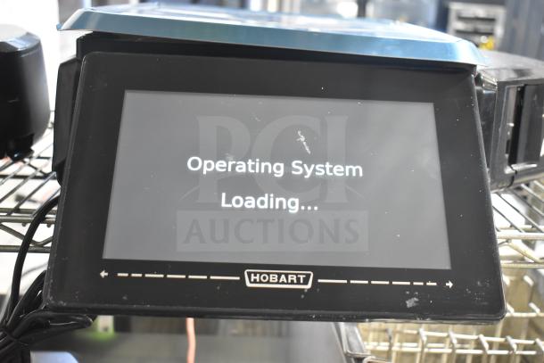 Hobart HTi-7LH4W food portioning scale, tested and working, 120/208-240V, 1 phase, operating system loading screen shown.