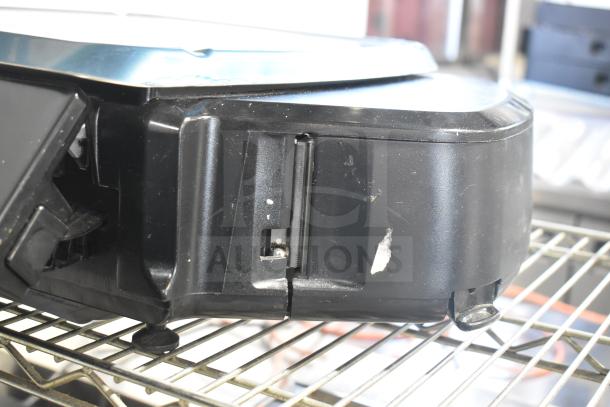 Hobart HTi-7LH4W commercial countertop scale in black. Shows minor wear. Tested and working. 120/208-240V, 1 Phase.