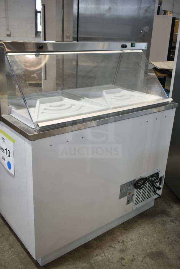 Brand new Avantco 178CPW47HC ice cream dipping cabinet, white, 47 1/8", holds 8 tubs, 115V, 1 phase, minor scratches.