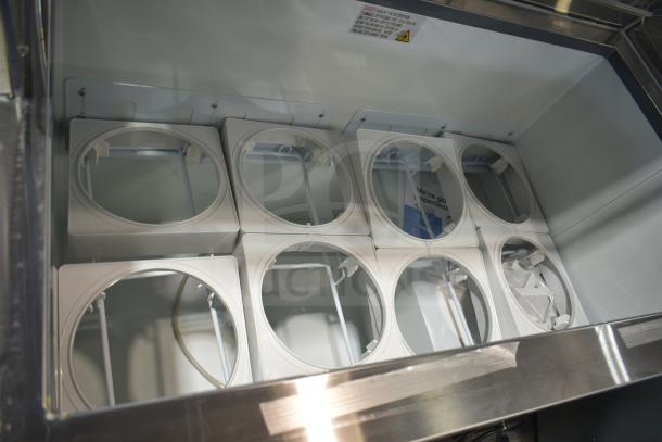 Brand new Avantco 178CPW47HC 47 1/8" 8 tub white ice cream dipping cabinet, scratch and dent, 115V, 1 phase.