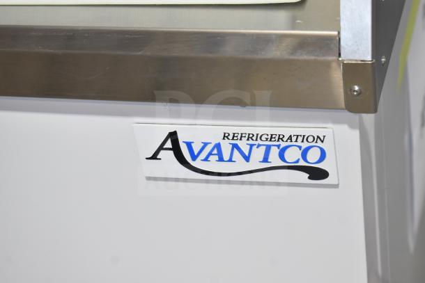 Brand new Avantco 178CPW47HC ice cream cabinet, white, 47 1/8", 8 tubs, 115V, scratch and dent, clear Avantco label visible.