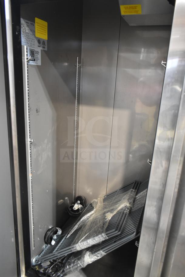 Brand new Avantco 447AP49R commercial cooler, scratch and dent, with 2 doors and casters. 115 volts, 1 phase.