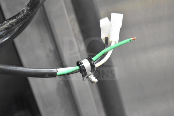 Close-up of wiring connection on the 2025 Avantco 447AP49R Commercial 2 Door Reach In Cooler.