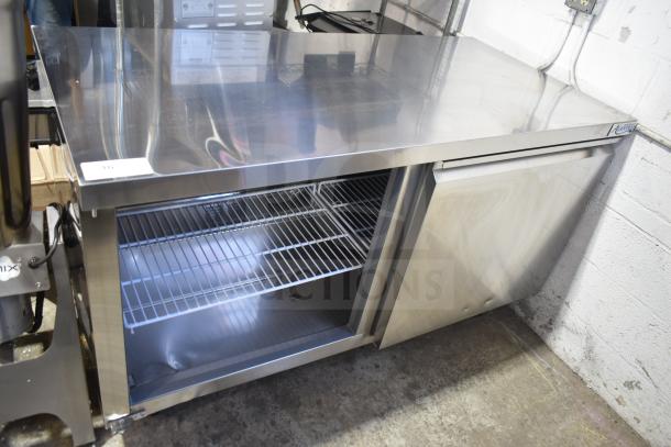 Brand new Avantco 178SSUC60FHC commercial 2-door work top freezer with missing doors, 115V, 1 phase, scratch and dent condition.