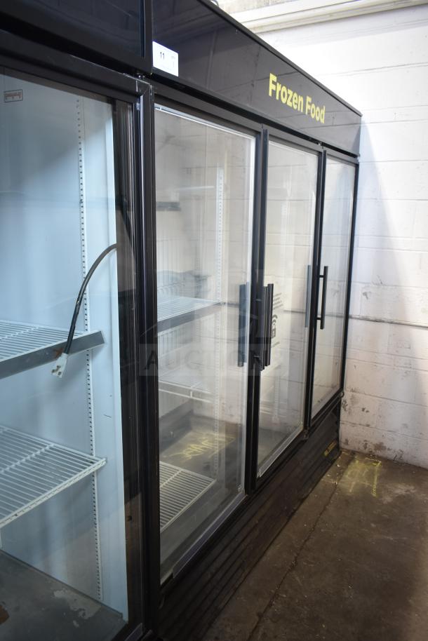 True GDM-72F-LD commercial 3-door reach-in freezer merchandiser in good condition, suitable for frozen food display.