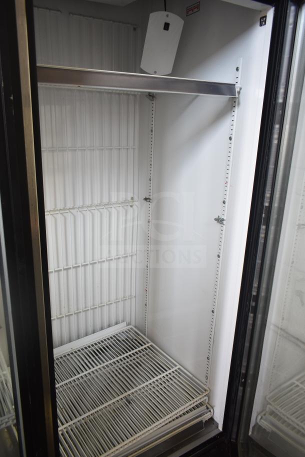 True GDM-72F-LD Commercial Freezer with 3 glass doors, white interior, adjustable shelving; 115/208-230V, 1 Phase.