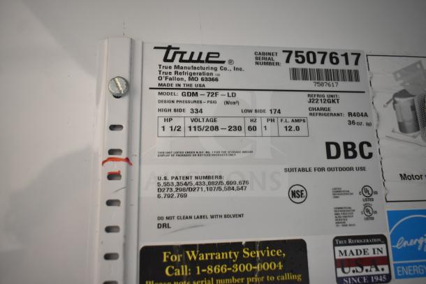 True GDM-72F-LD Commercial Freezer label; 115/208-230V, 1 Phase; Model details, NSF and UL certifications visible.