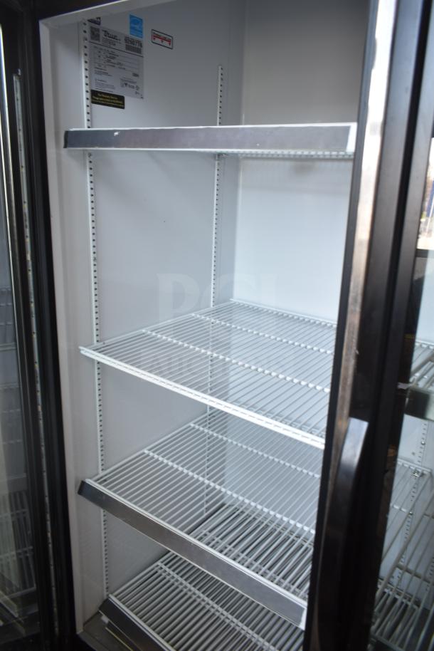 2017 True GDM-72-LD 3 Door Reach-In Cooler, commercial merchandiser with shelves, 115/208-230V, 1 Phase, good condition.