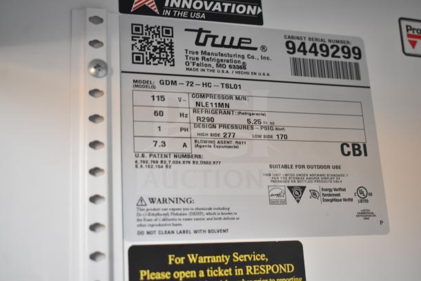 True GDM-72-LD Commercial 3 Door Reach In Cooler label showing voltage, refrigerant R290, and serial number 9449299.