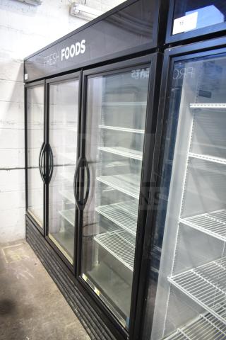 2018 True GDM-72-LD 3 Door Reach In Cooler Merchandiser, 115V, commercial use, glass doors, shelving intact, good condition.