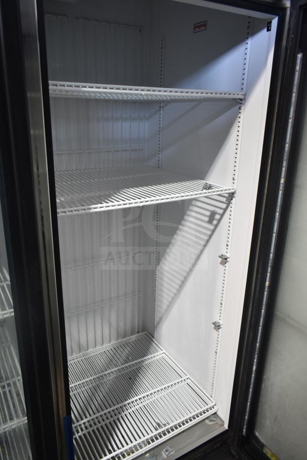 2018 True GDM-72F-LD commercial freezer, 3-door, interior shelves, white finish, 115/208-230 volts, excellent condition.