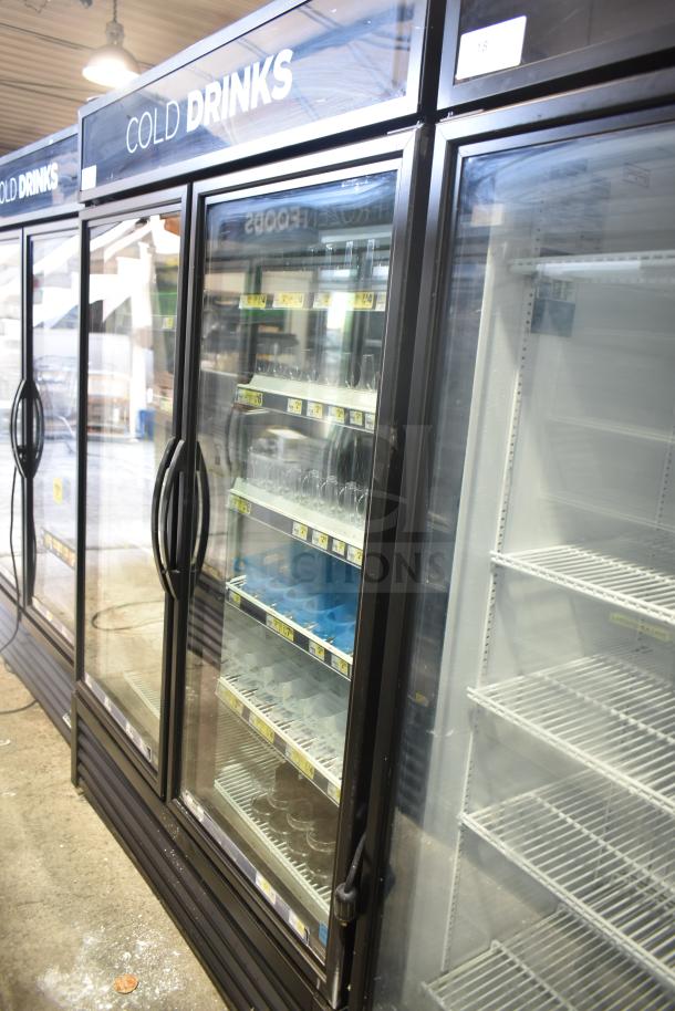2019 True GDM-49-HC commercial cooler, 2 glass doors, shelves visible. "Cold Drinks" label. 115V, 1 phase.