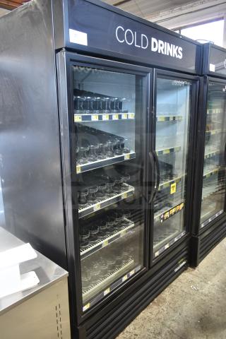 2019 True GDM-49-HC 2-door reach-in cooler, commercial use, 115 volts, 1 phase. Features glass doors and sturdy shelves.