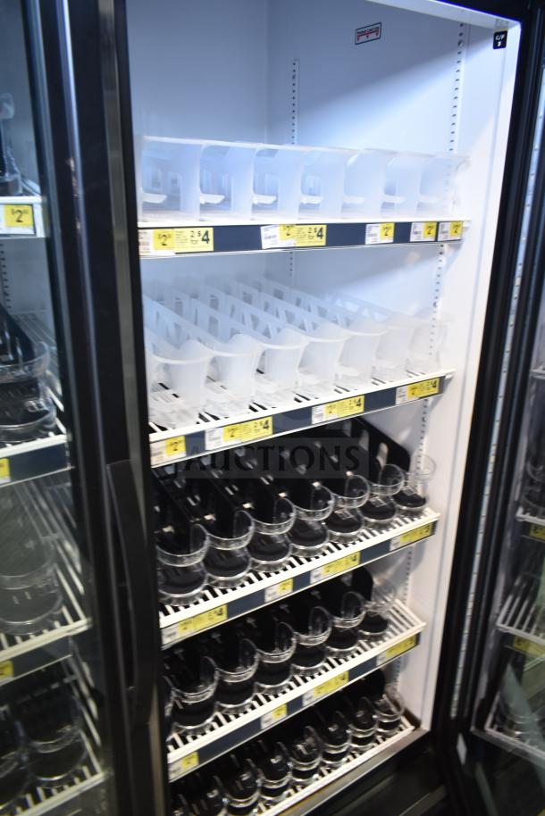 2019 True GDM-49-HC commercial cooler, two-door reach-in model, white interior, price labels visible, good condition.